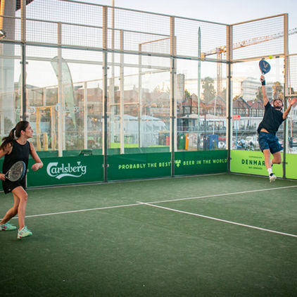 Padel players on a court